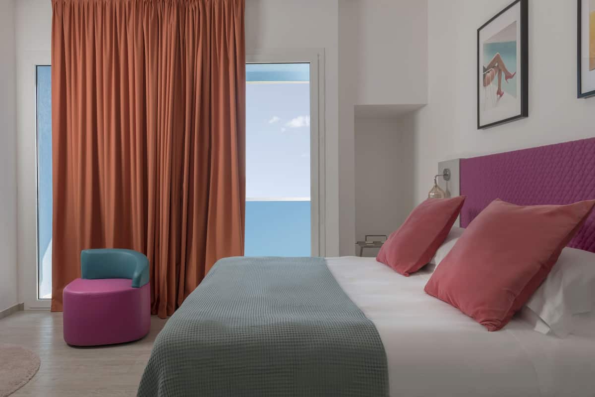 Deluxe Quadruple Room | Egyptian cotton sheets, premium bedding, memory foam beds, in-room safe