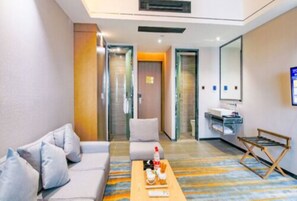 シグネチャー スイート | リビング エリア | 薄型テレビ、有料ムービー