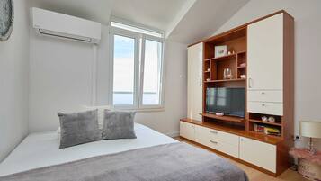 1 habitación, tabla de planchar con plancha, wifi gratis y ropa de cama