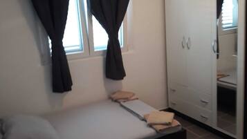 2 quartos, Wi-Fi de cortesia, roupa de cama