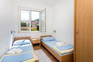 2 quartos, Wi-Fi de cortesia, roupa de cama