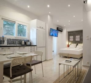 Apartment | Living area | TV - Wonderful Renovated Studio In Thisio (Athens)