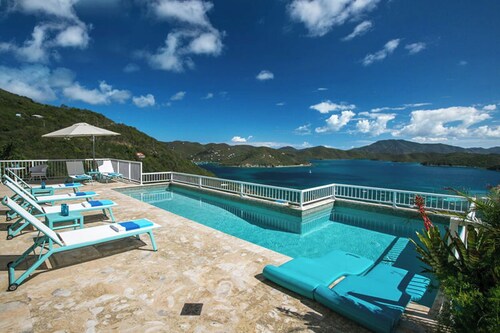 Discover Island Girl—the ultimate stunning villa that offers breathtaking views, a refreshing pool, and luxurious air conditioning! Experience paradise like never before!