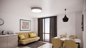 A modern living room with a sofa, dining table, and chairs. There is a clock on the wall and a framed picture above the sofa. - Lusso (Macclesfield)