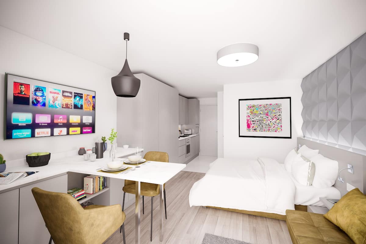 A modern bedroom with a bed, bedside table, and a large window.