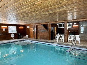 Relax by the pool, surrounded by comfortable seating and a serene atmosphere.