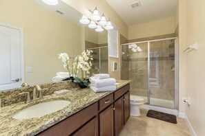 Combined shower/tub, towels, shampoo