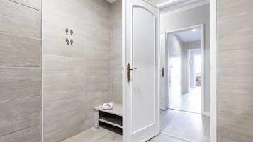 Combined shower/tub, hair dryer, towels, soap