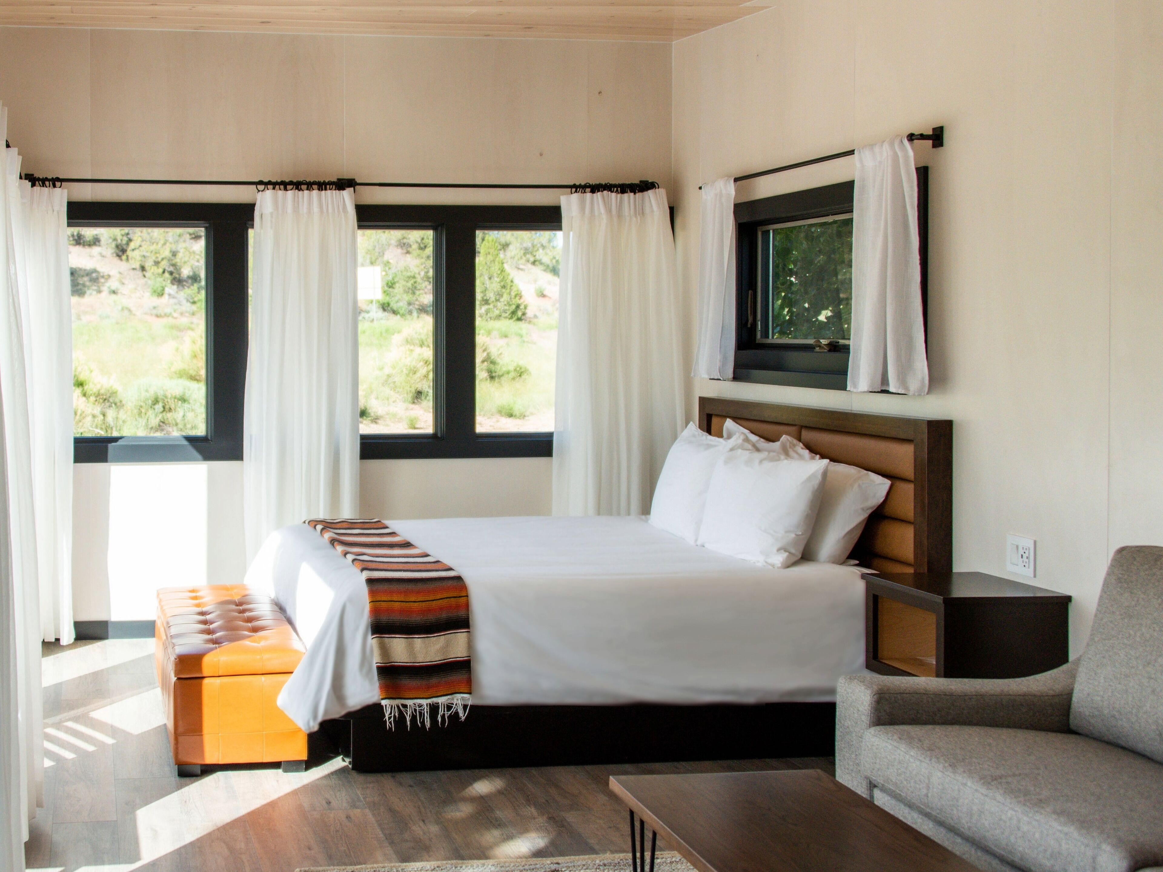 Private Deluxe Cabin with Upscale Resort Amenities | Premium bedding, down comforters, laptop workspace, soundproofing