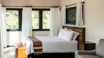Private Deluxe Cabin with Upscale Resort Amenities | Premium bedding, down comforters, laptop workspace, soundproofing