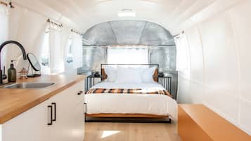 Modernized Vintage Airstream with Upscale Resort Amenities | 1 bedroom, premium bedding, down comforters, individually decorated