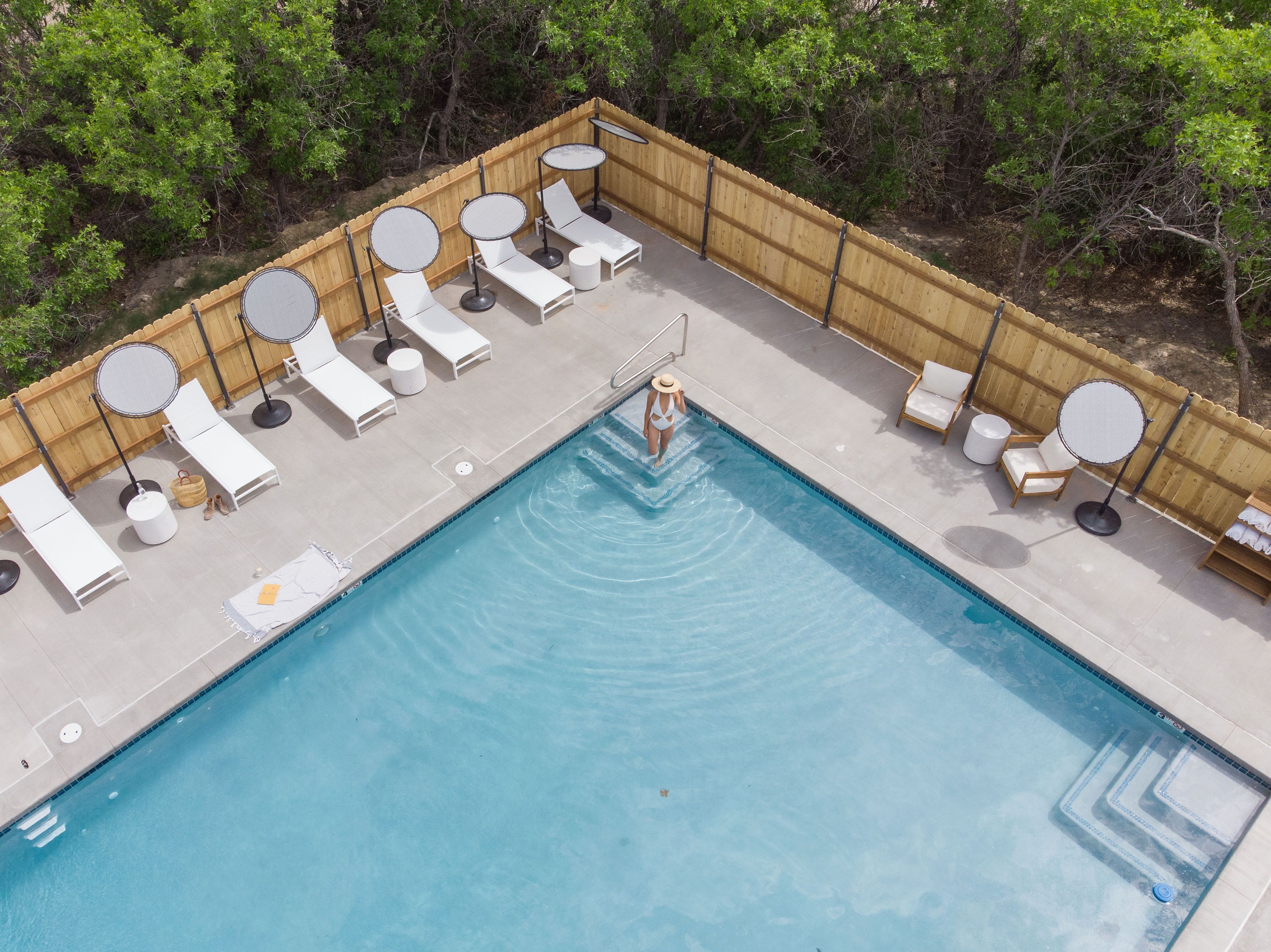 Outdoor pool, open 8:00 AM to 10:00 PM, pool umbrellas, sun loungers