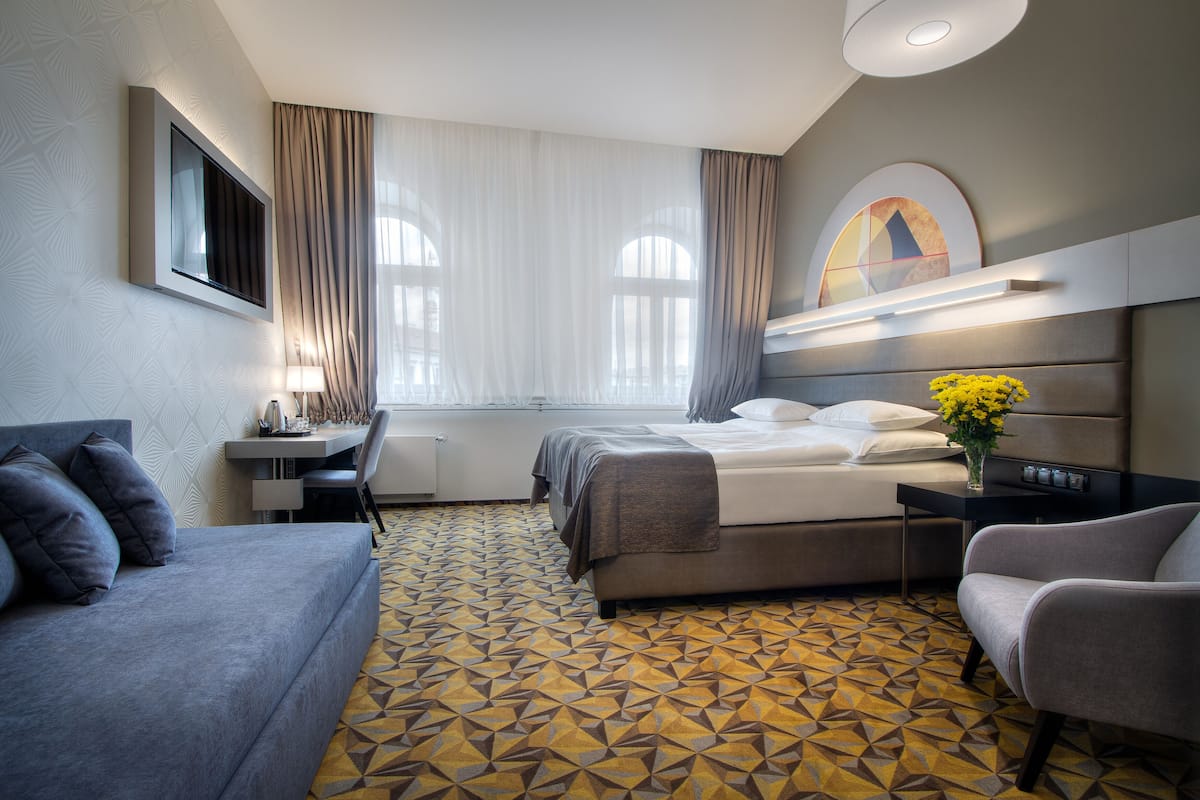 Junior Suite | 1 sovrum, allergitestade sÀngklÀder och Select Comfort-madrasser