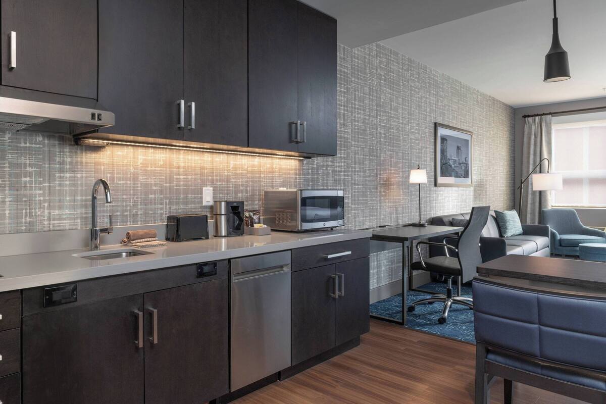 desk, laptop workspace, blackout curtains, iron/ironing board