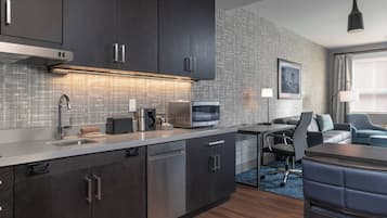 Desk, laptop workspace, blackout drapes, iron/ironing board