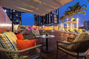 Outdoor pool, open 8:00 AM to 8:00 PM, pool umbrellas, pool loungers