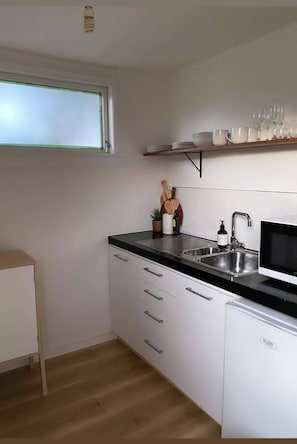 Fridge, microwave, electric kettle, toaster