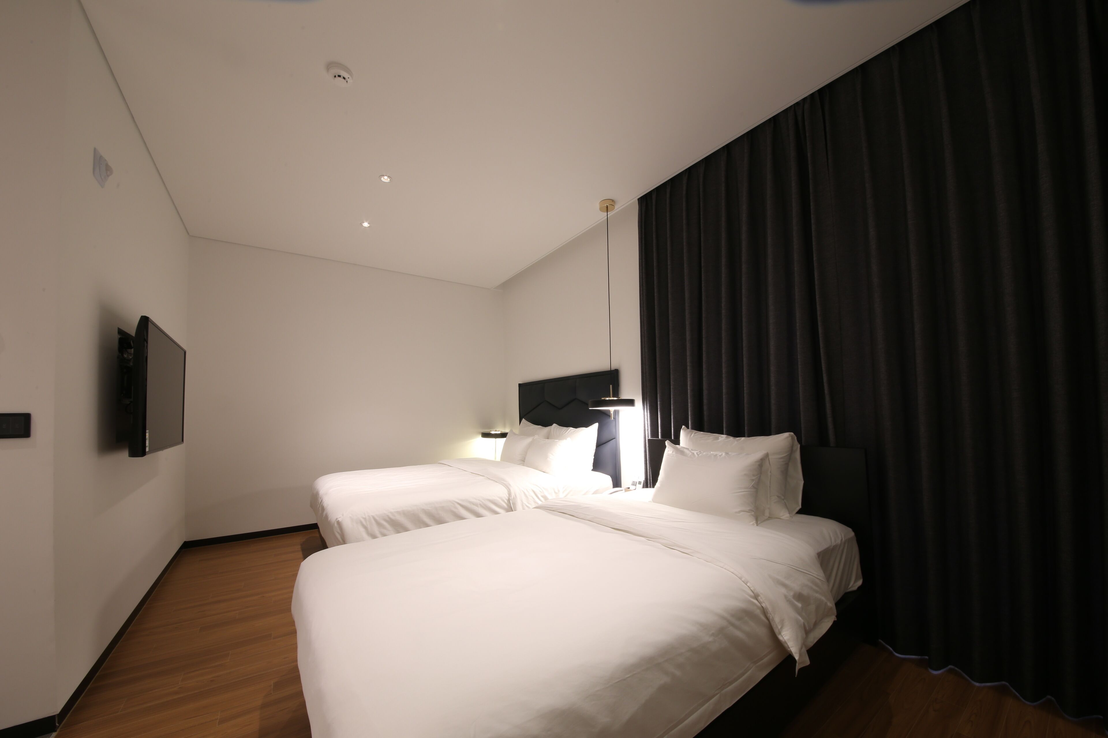 premium bedding, down duvets, memory-foam beds, free wifi