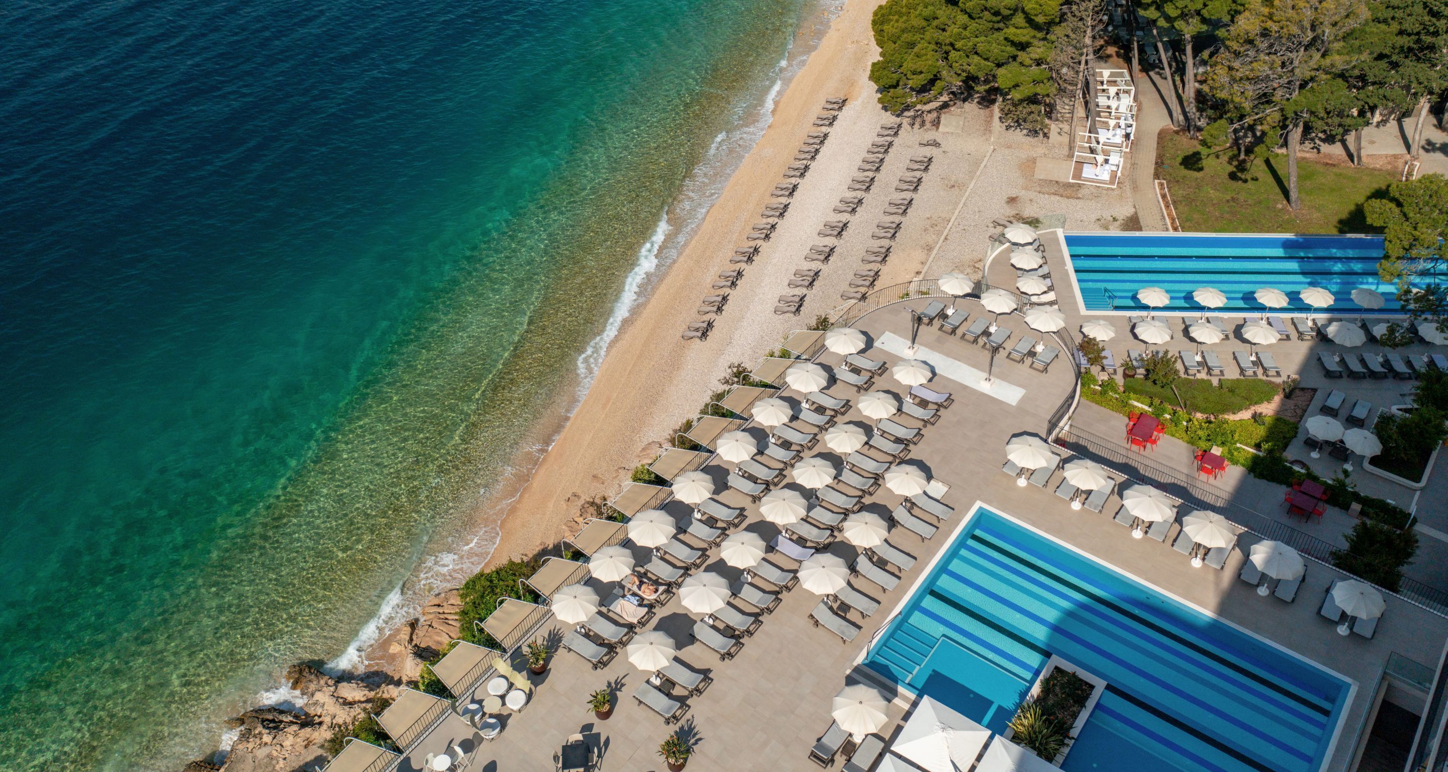 On the beach, beach cabanas, sun-loungers, beach umbrellas