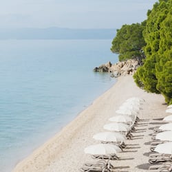 On the beach, beach cabanas, sun-loungers, beach umbrellas
