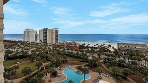 A resort with a pool, beach view, and multiple buildings. - Gulf Views~Steps2Beach~FAB Lagoon Pool~2BR Sterling Shores 916 (Destin)