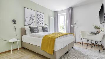1 bedroom, premium bedding, individually decorated, desk