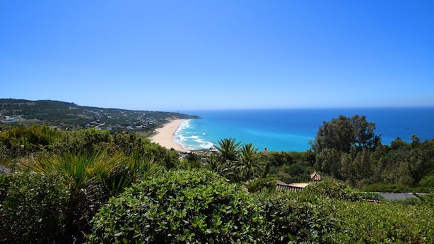 A coastal landscape with a beach, greenery, and a clear sky. - Andalusian style villa with stunning views. PAX 6. FREE WIFI (Tarifa)