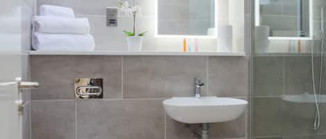 Apartment, 1 Bedroom | Bathroom | Shower, free toiletries, hair dryer, towels