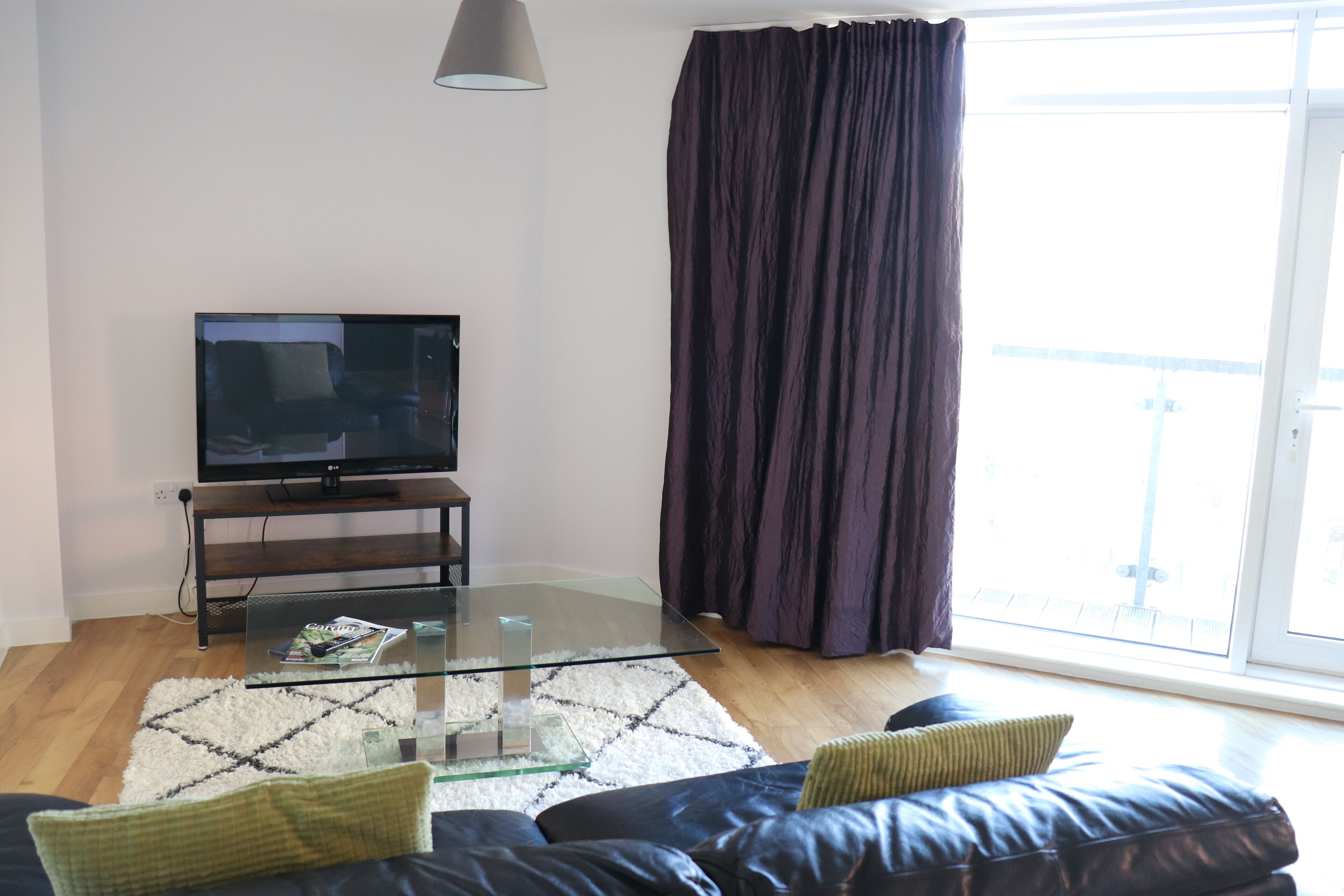 One Bedroom Apartment with Balcony | Living area