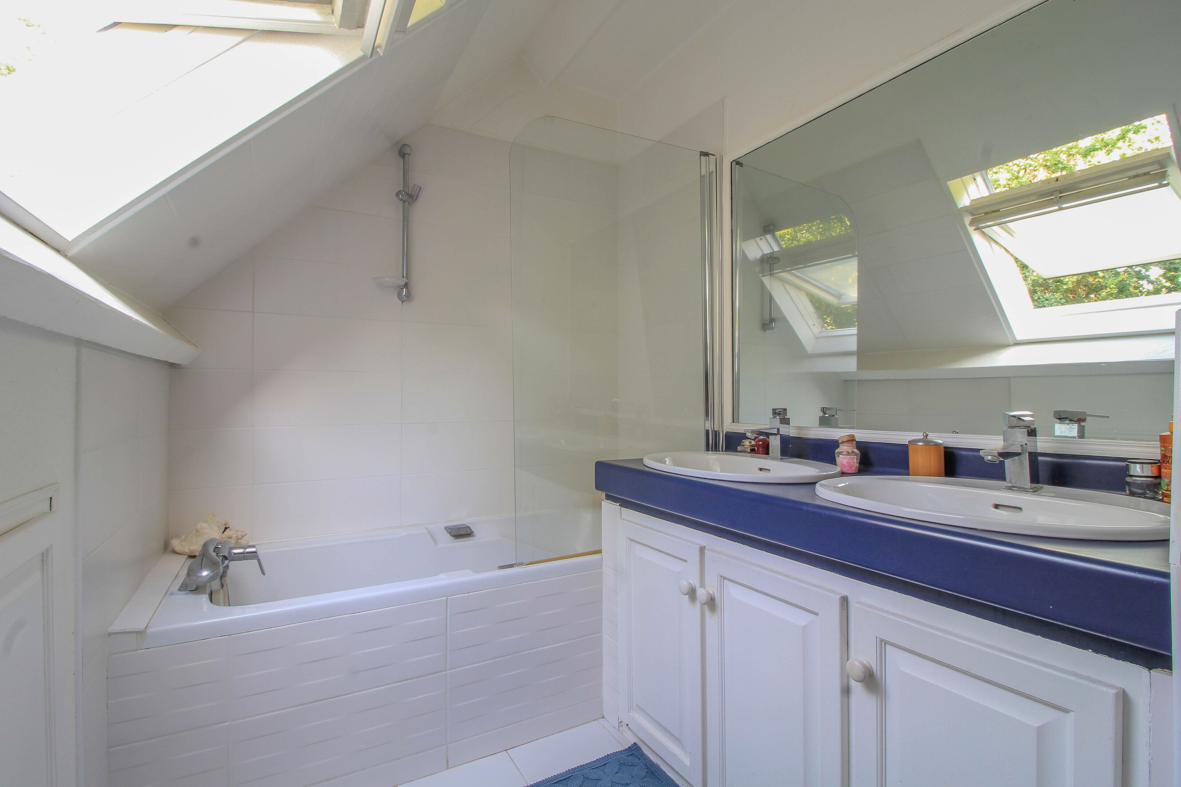 Combined shower/tub, hair dryer, towels, toilet paper