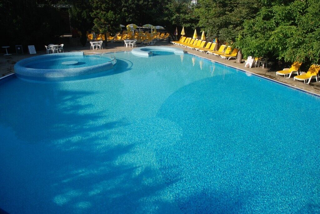 Seasonal outdoor pool, pool umbrellas, pool loungers