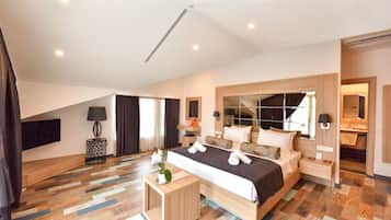 Camera Deluxe con letto matrimoniale o 2 letti singoli | Una cassaforte in camera, postazione laptop, insonorizzazione