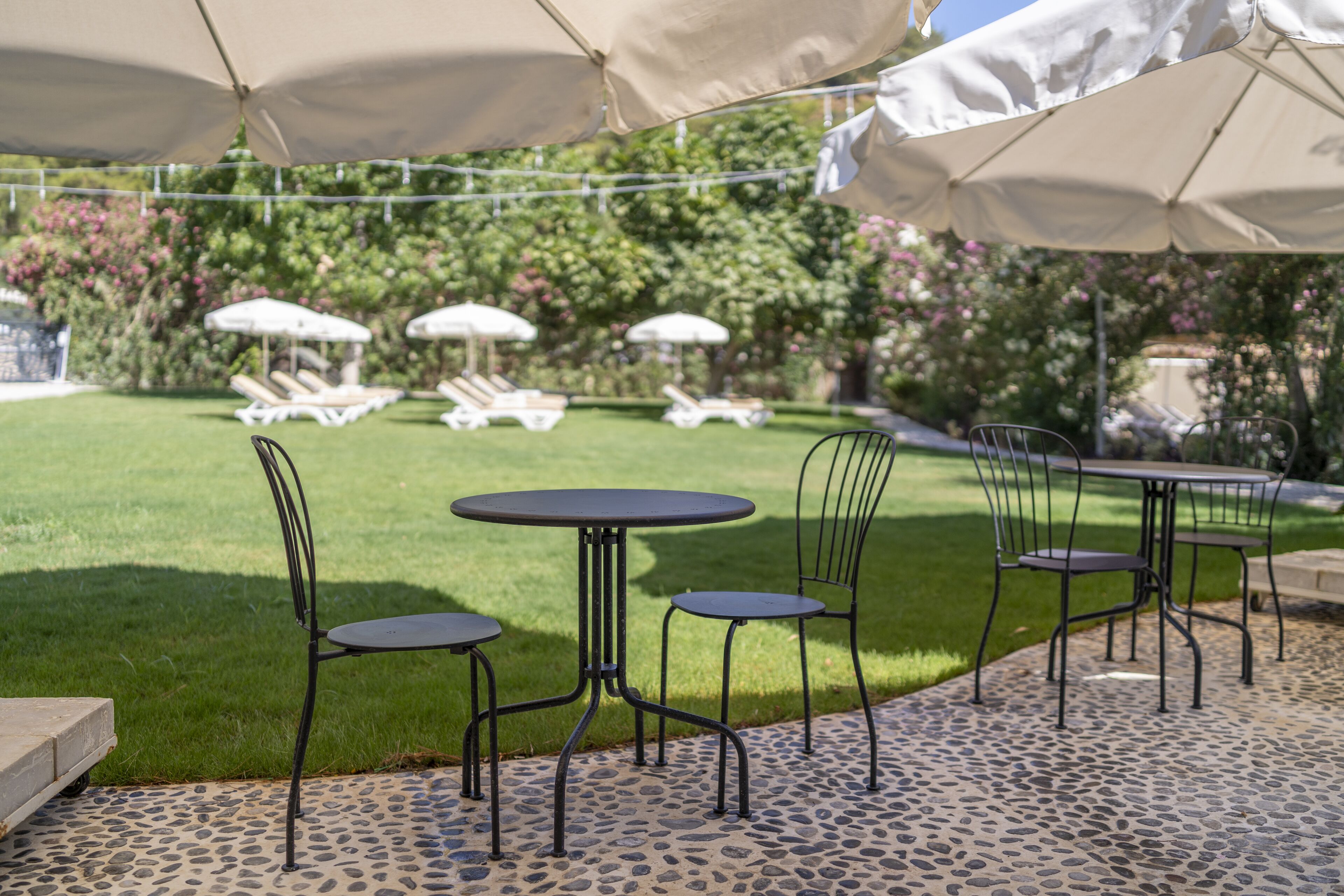 private beach nearby, black sand, free beach shuttle, sun-loungers