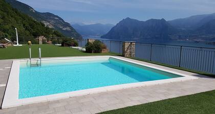 Vacation apartment with wonderful panoramic lake view, 2 terraces, pool, parking lot