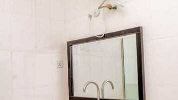 Shower, towels, soap, toilet paper