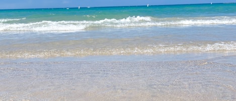 On the beach, white sand