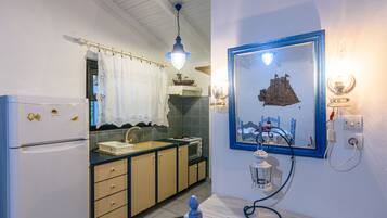 Apartment | Private kitchenette | Fridge, oven, stovetop, electric kettle