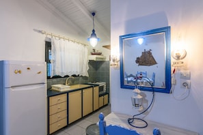Apartment | Private kitchenette | Fridge, oven, stovetop, electric kettle