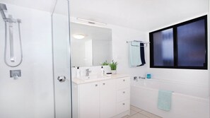 Bathtub, hair dryer, towels