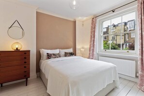 2 bedrooms, iron/ironing board, travel crib, internet
