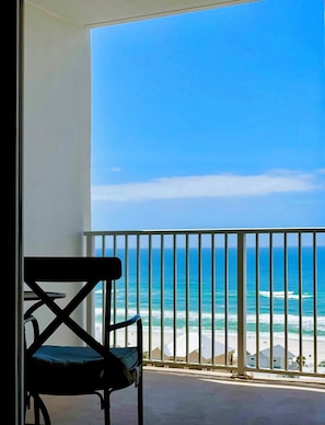 A balcony with a view of the ocean and beach. - Welcome to your fabulous beach get-away - a guest favorite with Gulf Views! (Panama City Beach)
