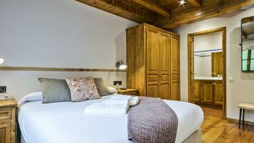 2 habitaciones, tabla de planchar con plancha y acceso a internet