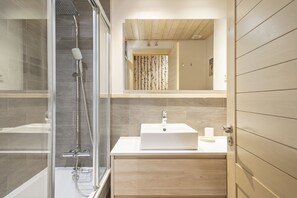 Bathtub, hair dryer, towels