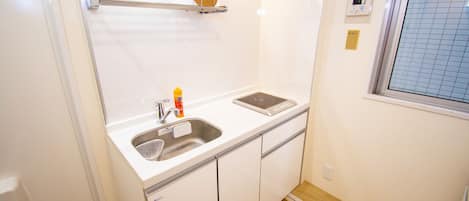 Apartment | Private kitchenette | Fridge, microwave, stovetop, cookware/dishes/utensils