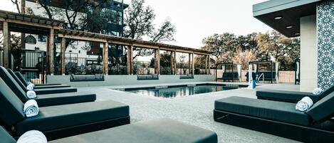 Seasonal outdoor pool, open 8:30 AM to 9:00 PM, pool loungers