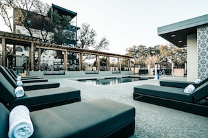 Seasonal outdoor pool, open 8:30 AM to 9:00 PM, sun loungers