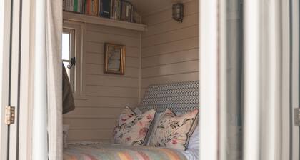 Peaceful shepherd's hut for secluded rural relaxation.