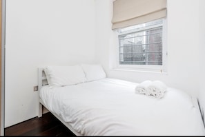 Apartment, 2 Bedrooms | 2 bedrooms, desk, laptop workspace, iron/ironing board