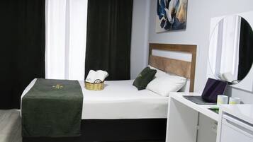 Premium bedding, blackout curtains, soundproofing, free WiFi