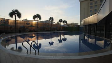 Indoor pool, outdoor pool, free pool cabanas, pool umbrellas